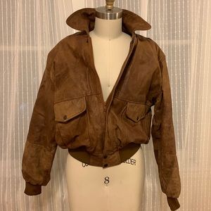 Vintage superfortress B-2 brown bomber jacket. Genuine leathers Rare size Small.